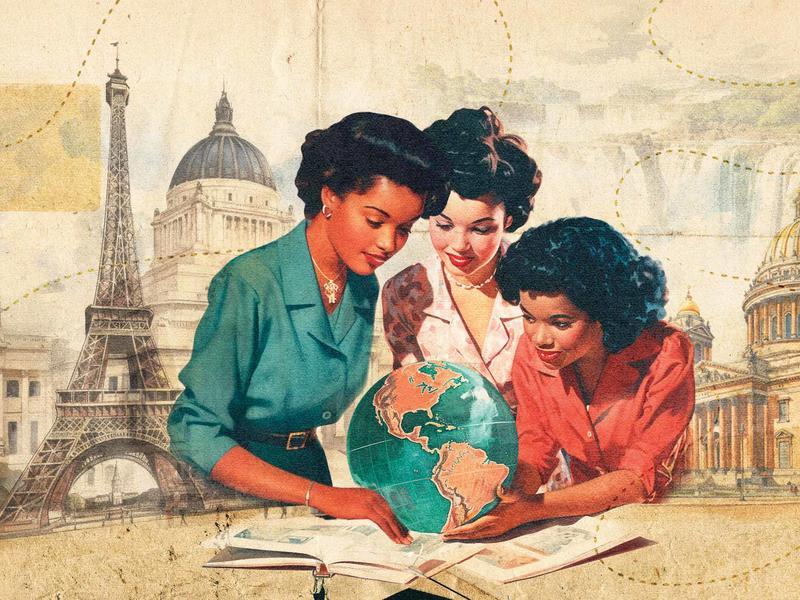 3 women looking at an open book and a globe