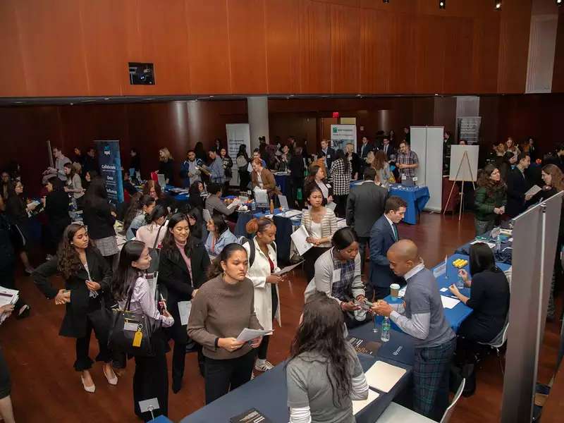 Job fair with lots of women students checking out potential employers
