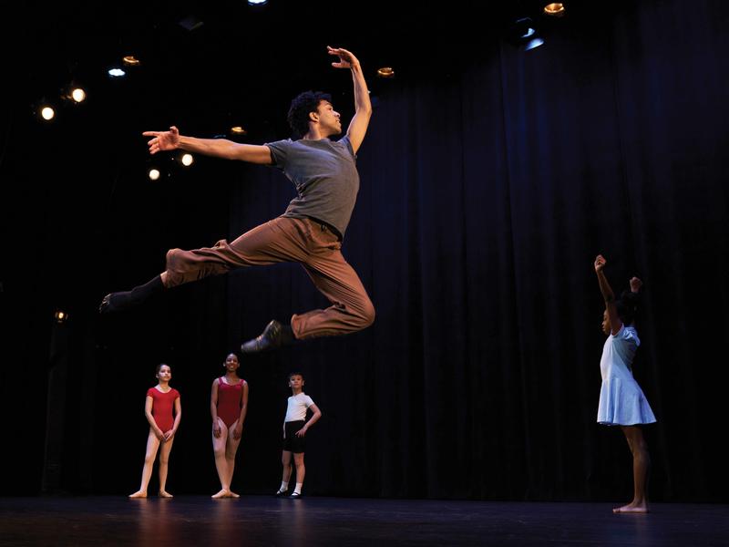 Image of young man leaping in dance