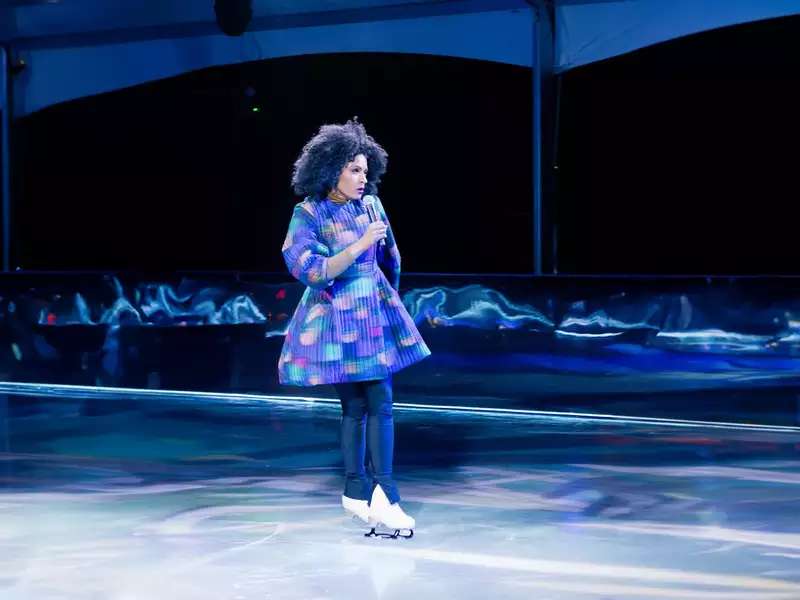 Alicia Hall Moran on the Ice in blue 