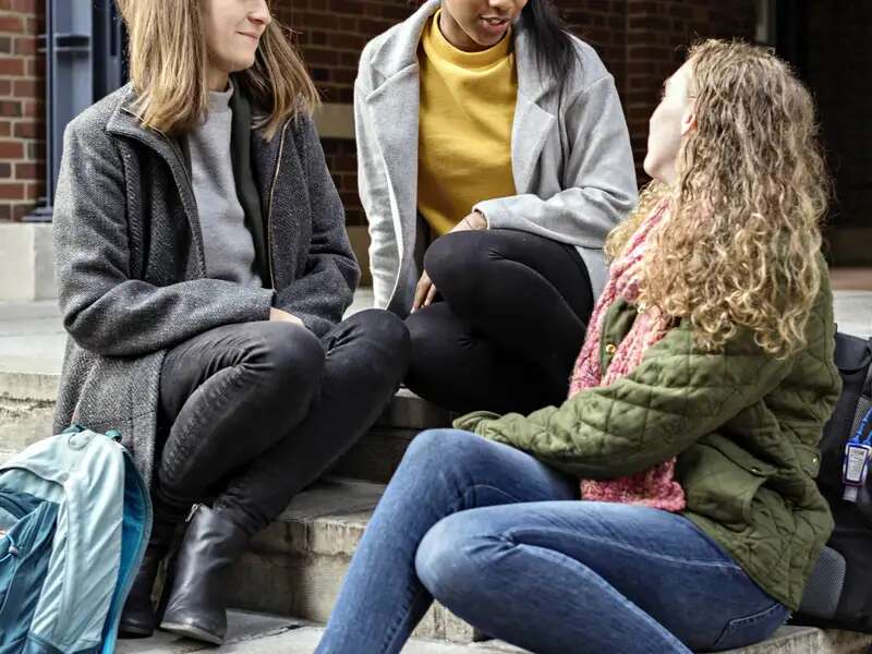 Anonymous studnets conversing 
