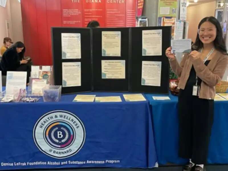 Furman social work intern tabling for the the Alcohol and Substance Awareness Program in the Diana Center