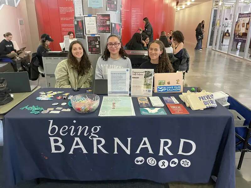 Students tabling in Barnard Hall sharing educational information