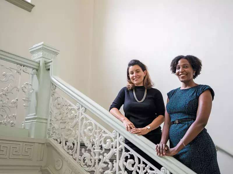 Vice President for Diversity, Equity, and Inclusion Ariana González Stokas (left) and Dean of the College Leslie Grinage. Photo by Jonathan King.