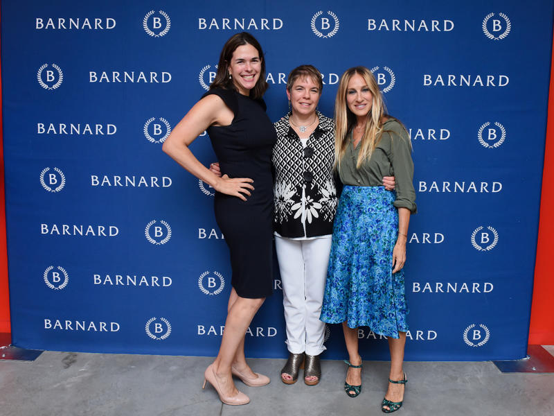 3 women side by side in front of a Barnard College blue background