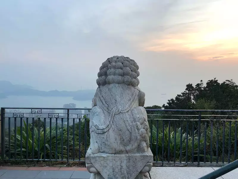 Statue overlooking the sea, called Everything the Light Touches