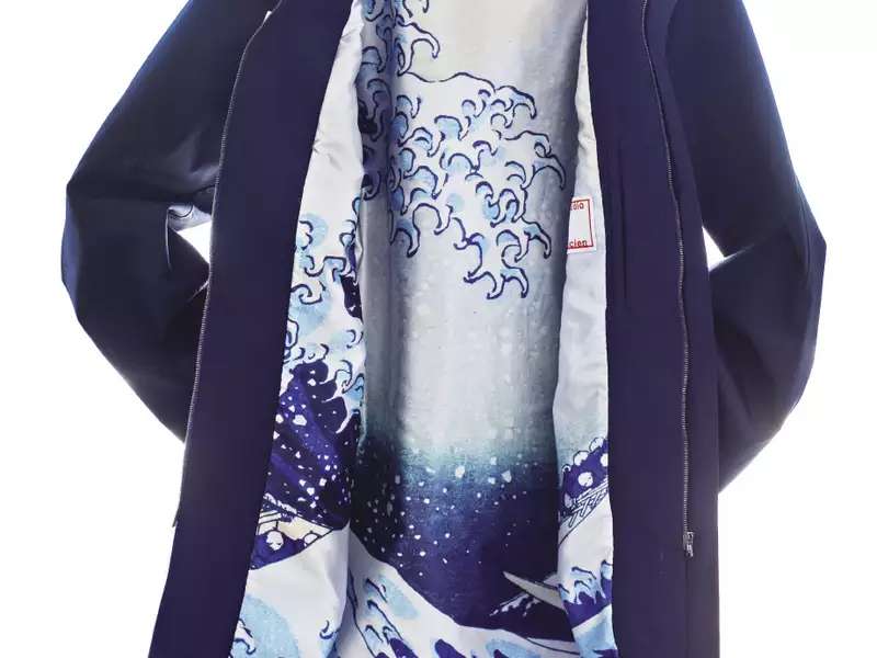 navy blue jacket with the lining painted with ocean waves