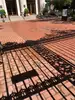 Main gate shadow on bricks